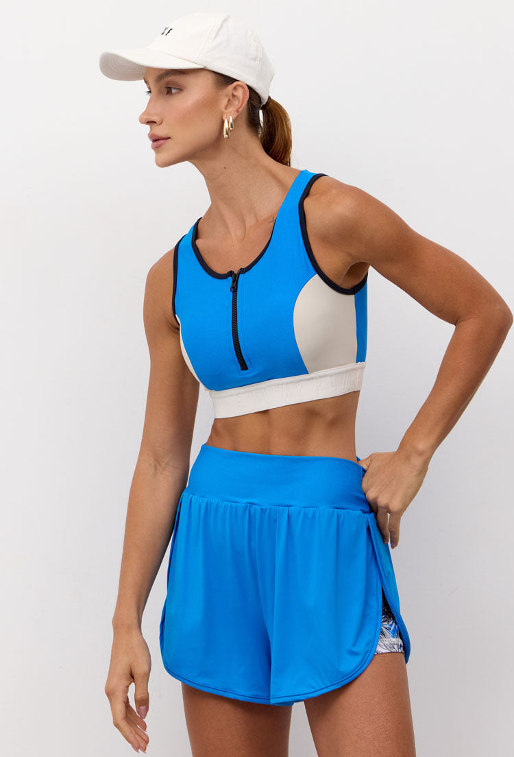 Short duplo liso azul santorini com bolso Athena