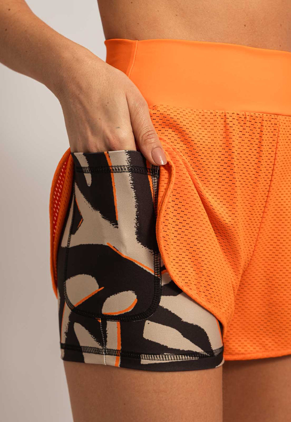 Shorts duplo liso laranja magnético Magnetic