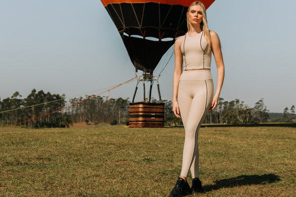 Qual a diferença entre roupas fitness de alta compressão e de baixa compressão?