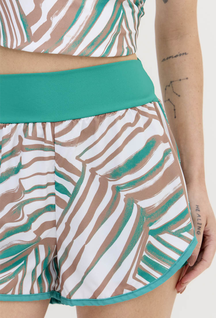 Shorts duplo verde folha com bolso estampado Lance