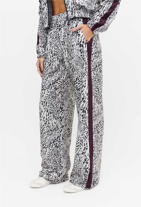 Calça wide leg estampada com faixa lateral e bolsos Instinto