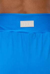 Short duplo liso azul santorini com bolso Athena