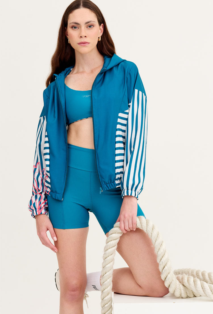 Jaqueta corta vento com capuz e recortes estampada listras Al mare
