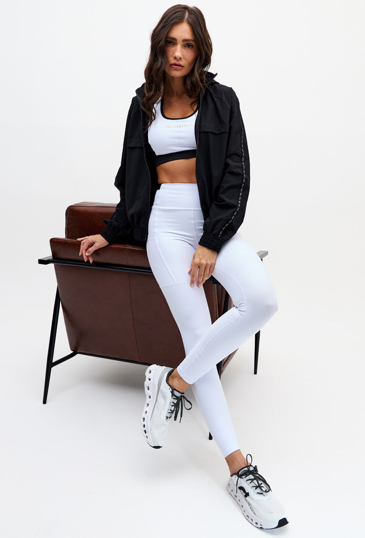 Legging branco cristal com detalhe preto bolsos laterais Pulsa