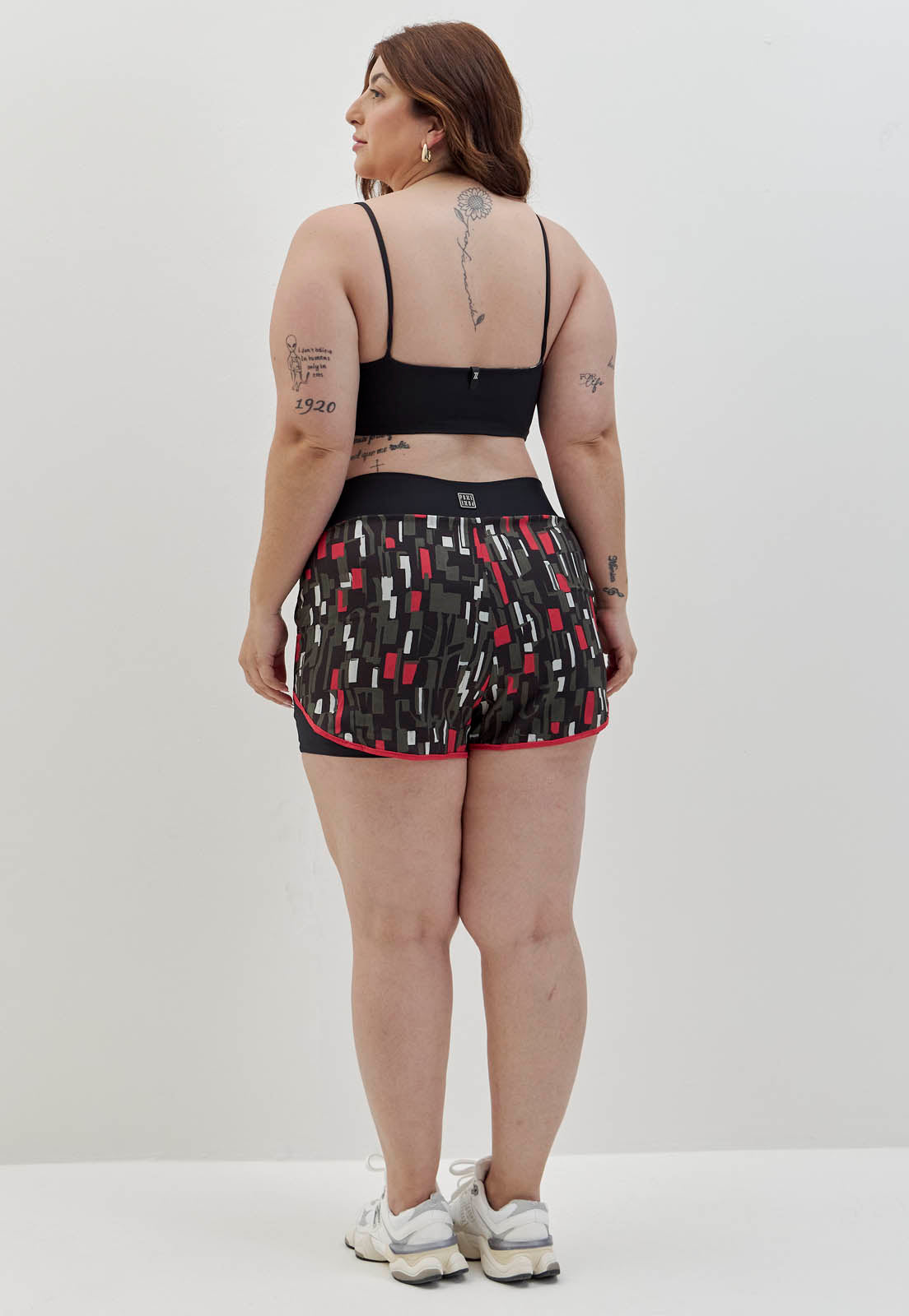 Shorts duplo preto com bolso estampado Voá