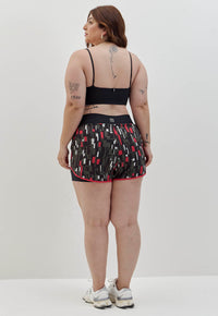 Shorts duplo preto com bolso estampado Voá